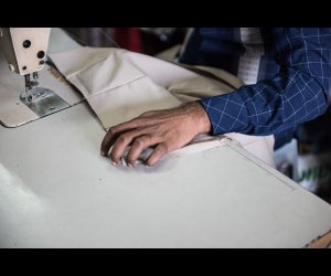 Tailor Sewing Clothes